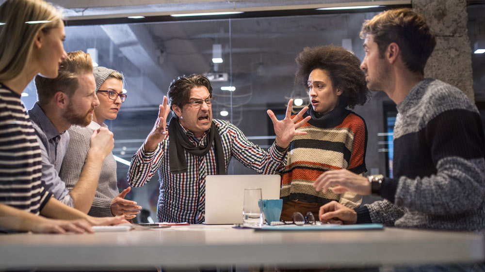 furious boss shouting at his team