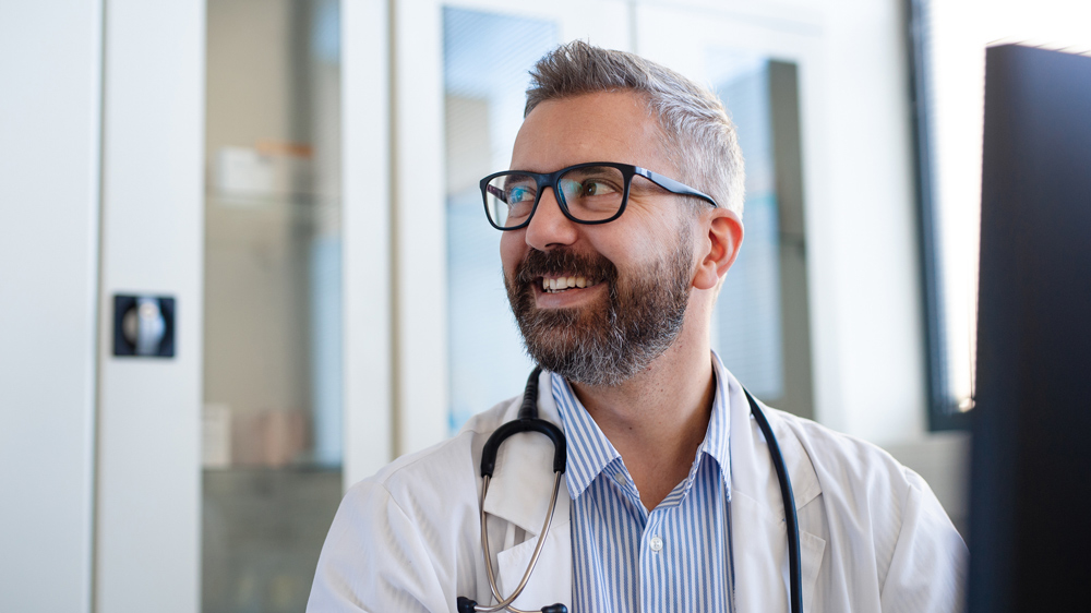 doctor sitting at desk