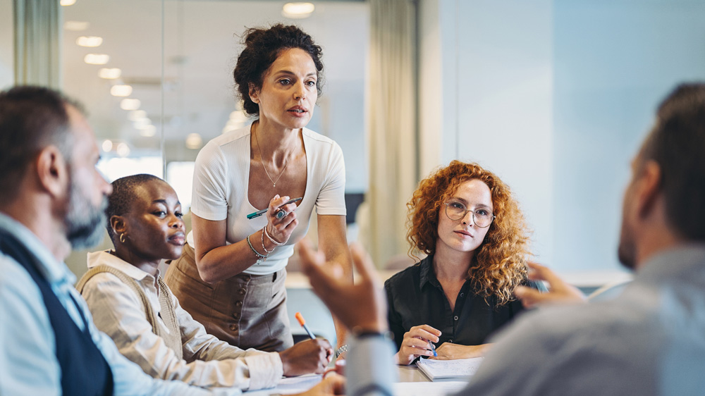 people in a meeting arguing