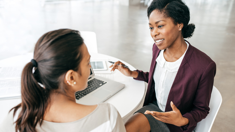 two women in a business meeting