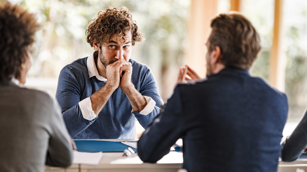 man in meeting, nervous