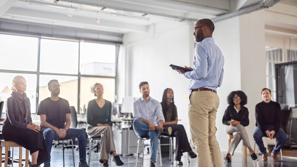 man leading a corporate training