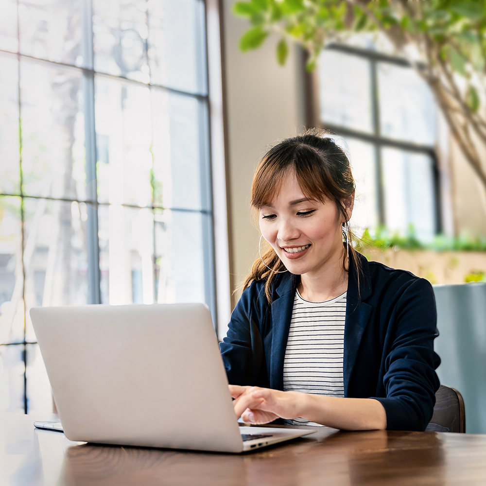 woman working on laptop from home