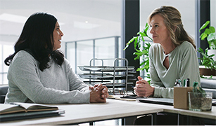 Two woman having a serious conversation